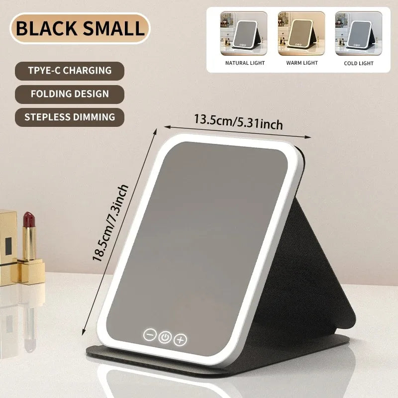 Specchio per il trucco portatile con schermo touch a LED, ricaricabile tramite USB, 3 modalità di illuminazione, pieghevole, ideale per il trucco in viaggio.